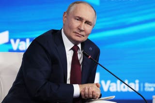 Russian president Vladimir Putin answers questions during a meeting with foreign policy experts at the Valdai Discussion Club in the Black Sea resort of Sochi